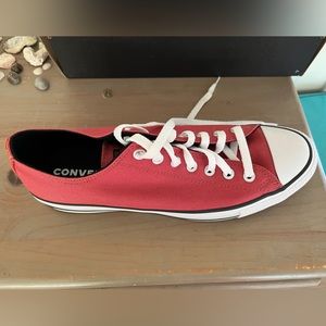 Brand new. Never worn. Red canvas converse.